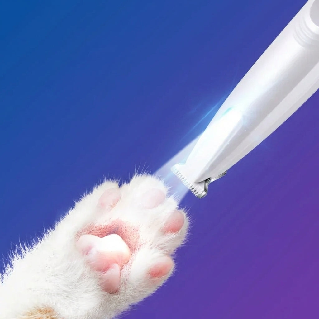 HairTrimPro LED light illuminating cat paw during trimming